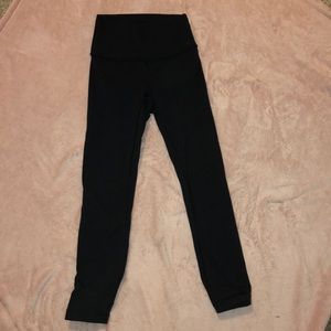 Black high rise wunder under Lululemon leggings